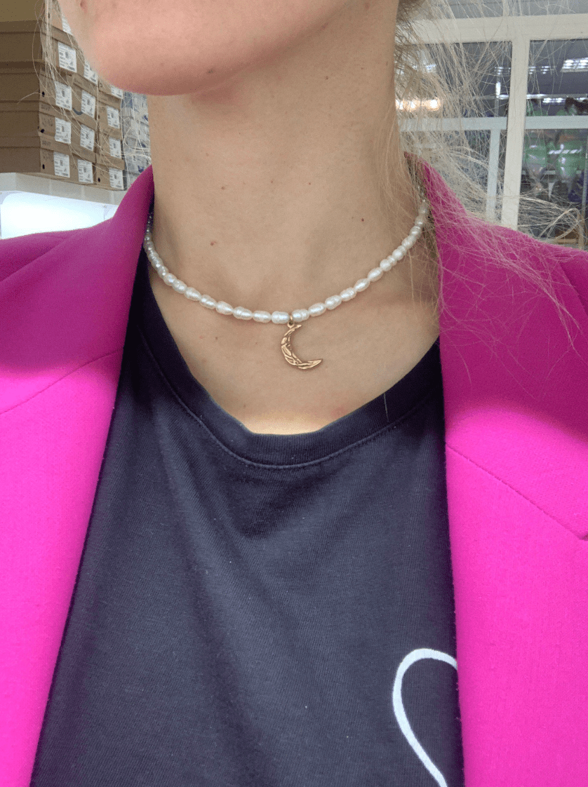 Taletha Crescent Gold Moon Natural Pearl Charm Necklace featuring a pearl coin and gold chain, symbolizing elegance and durability.