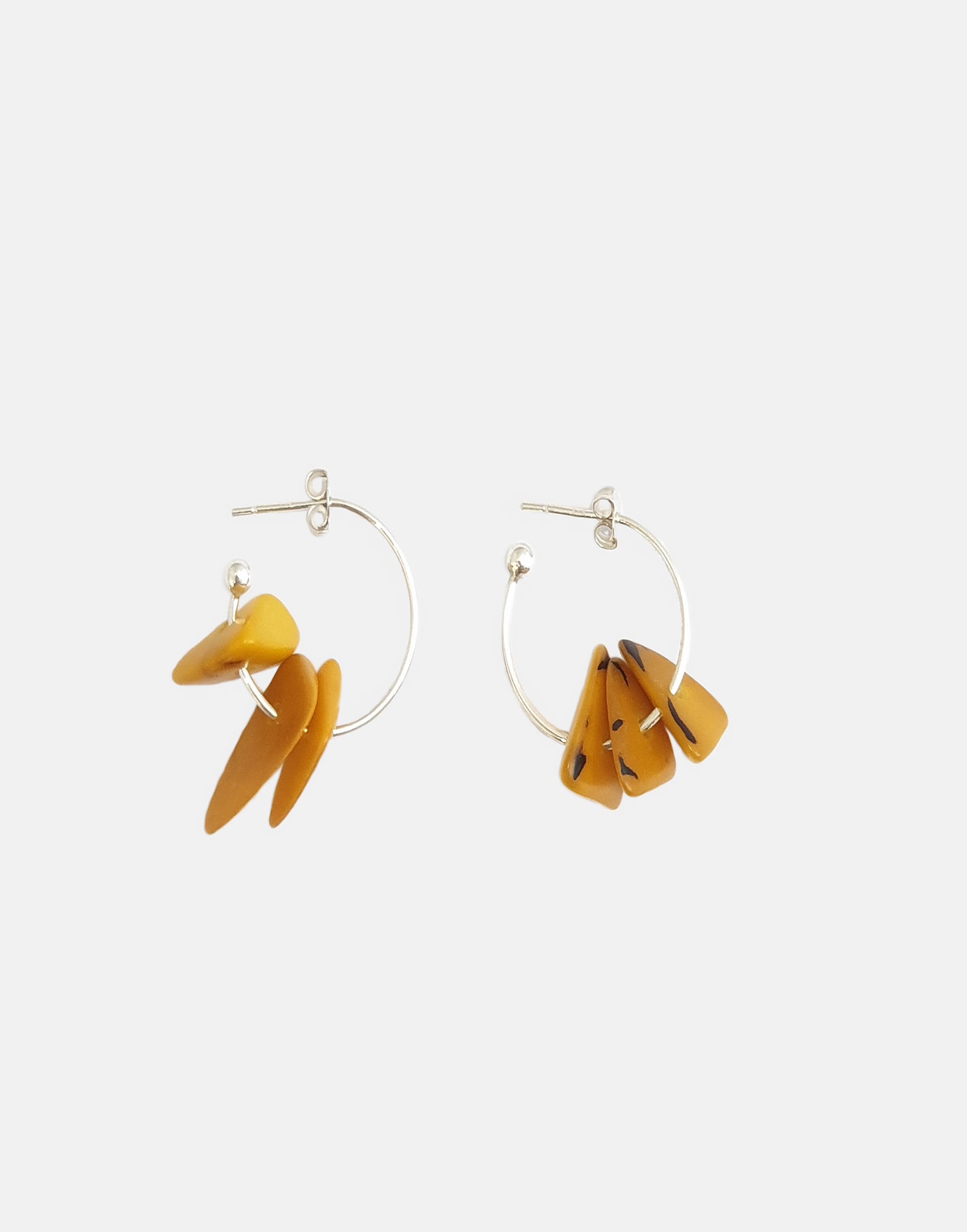 Tapajos Tagua Earring featuring a unique hoop design with three gravels, made from organic materials.