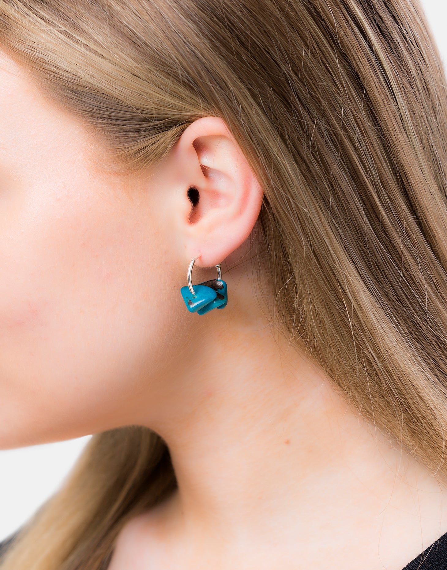 Tapajos Tagua Earring featuring a unique hoop design with three gravels, made from organic materials.