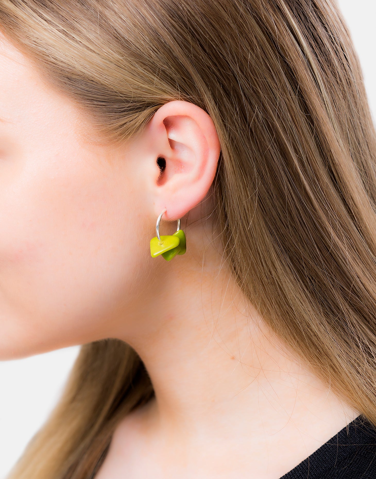 Tapajos Tagua Earring featuring a unique hoop design with three gravels, made from organic materials.