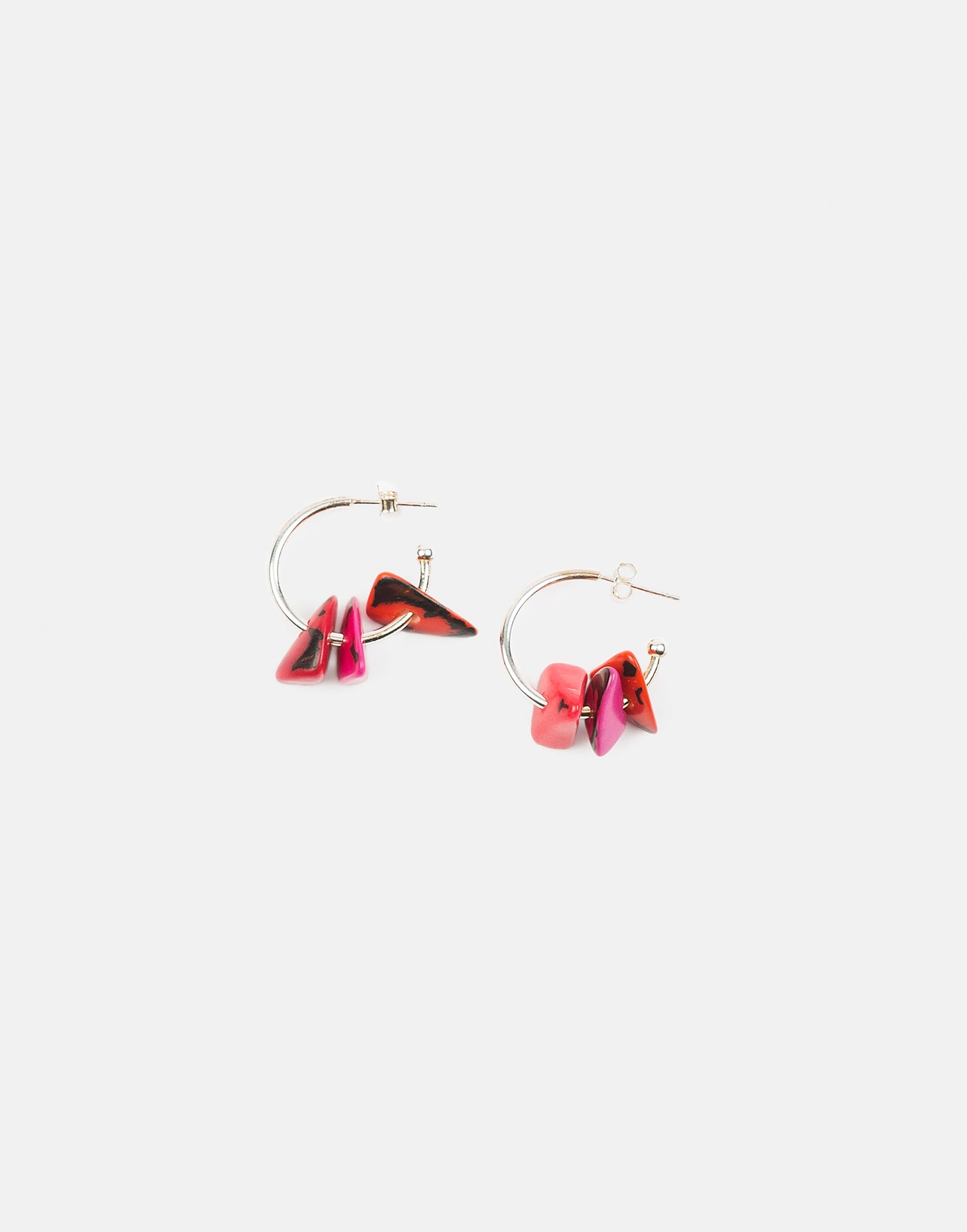 Tapajos Tagua Earring featuring a unique hoop design with three gravels, made from organic materials.