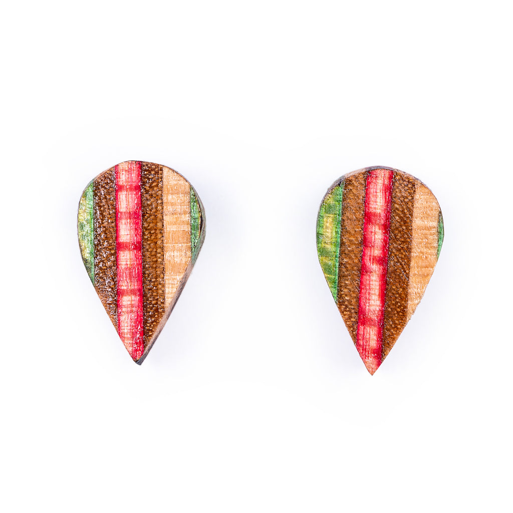 Colorful Tear Recycled Skateboard Stud Earrings handcrafted from upcycled skateboard materials, showcasing unique patterns and vibrant layers.