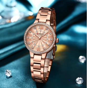 TENORIS Curren Women's Metal Watch featuring a round dial, quartz movement, and elegant design, perfect for formal occasions.