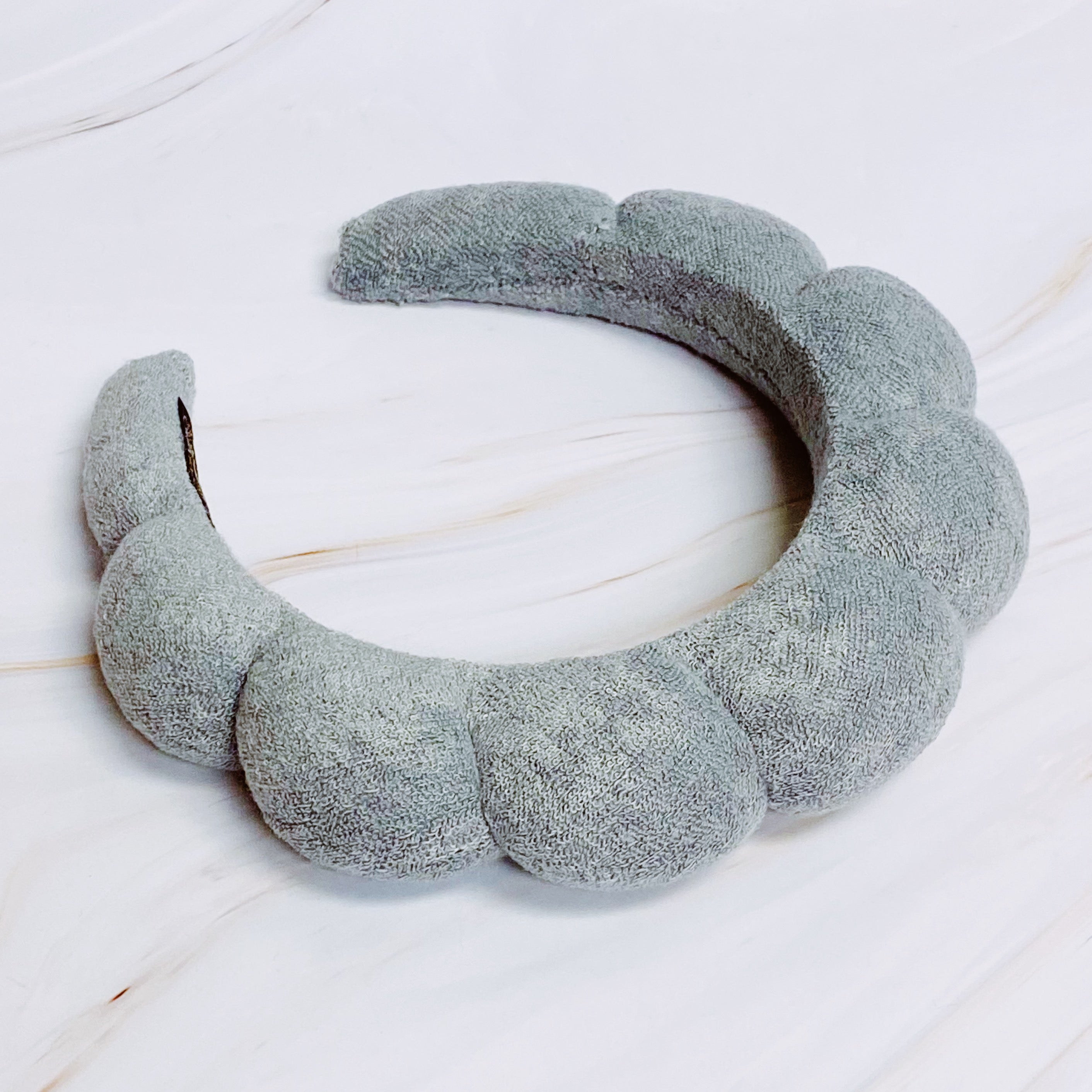 Terry Puffy Soft Headband in playful scalloped design, made of soft terry cloth fabric, perfect for casual and spa use.