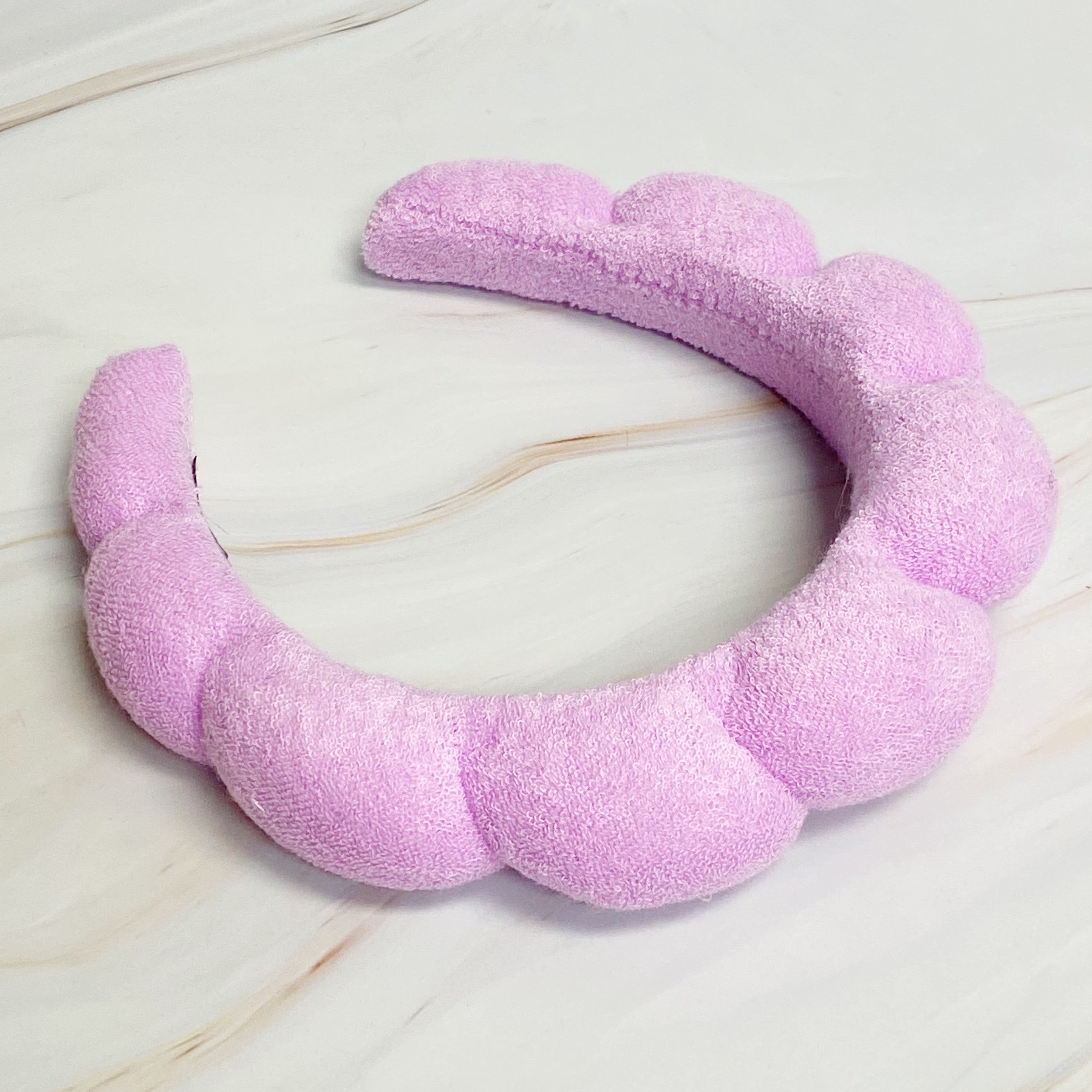 Terry Puffy Soft Headband in playful scalloped design, made of soft terry cloth fabric, perfect for casual and spa use.