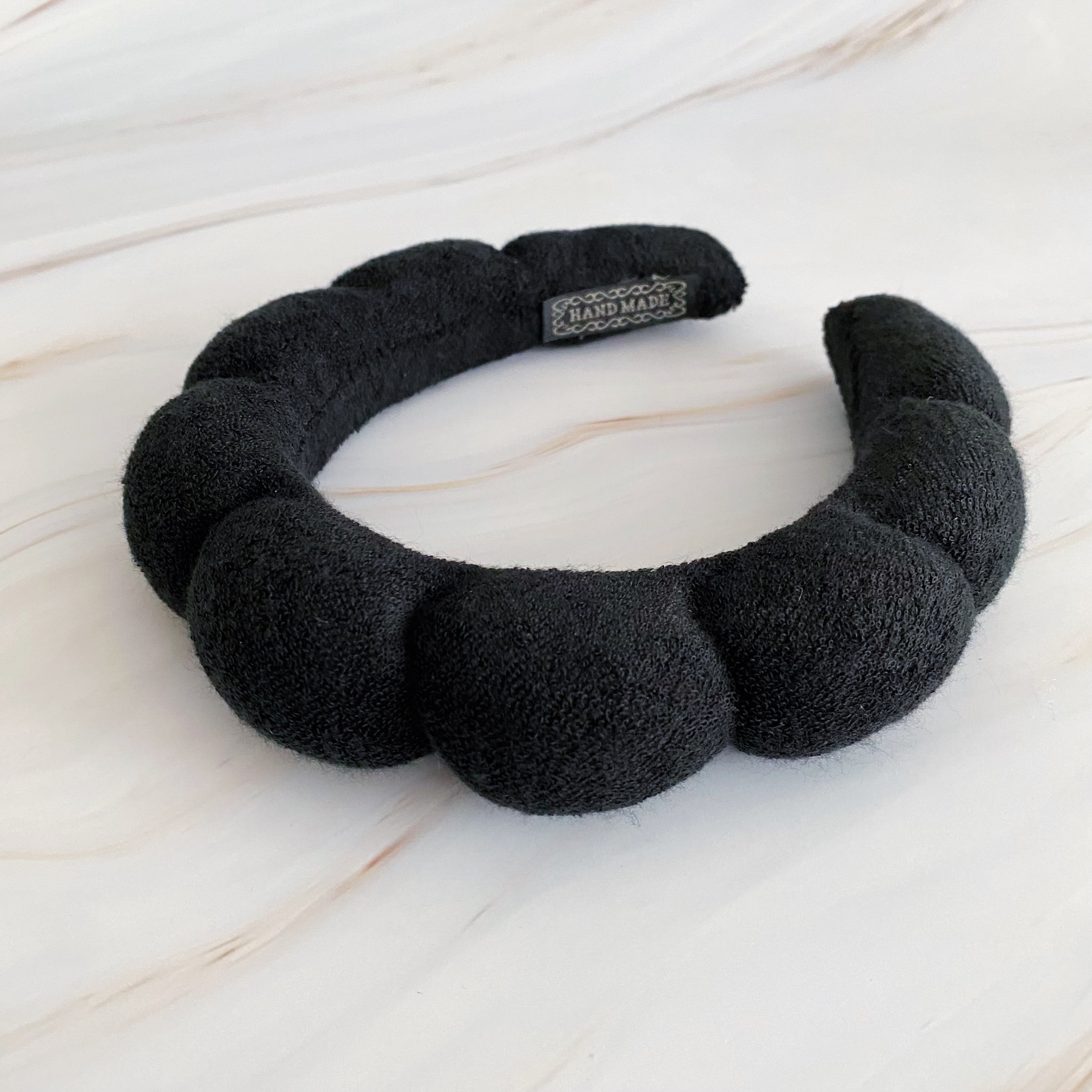 Terry Puffy Soft Headband in playful scalloped design, made of soft terry cloth fabric, perfect for casual and spa use.