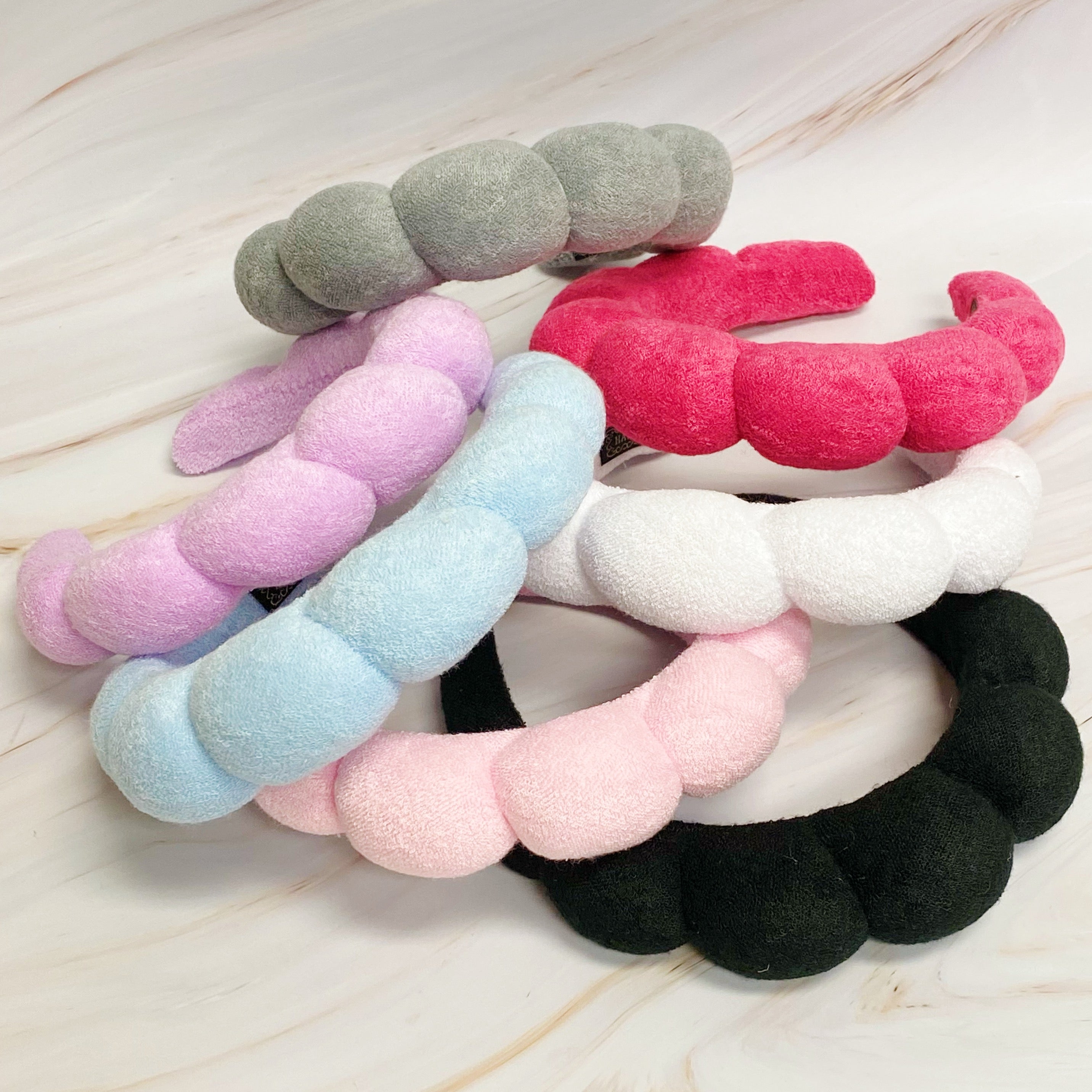 Terry Puffy Soft Headband in playful scalloped design, made of soft terry cloth fabric, perfect for casual and spa use.