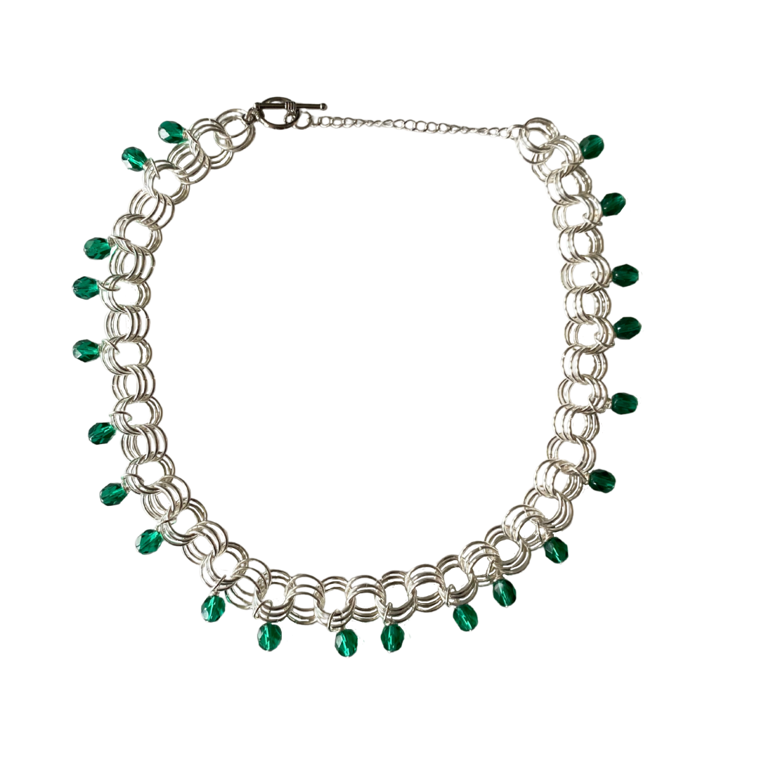 The Christina Choker in Teal featuring teal Czech glass beads and adjustable metal links.