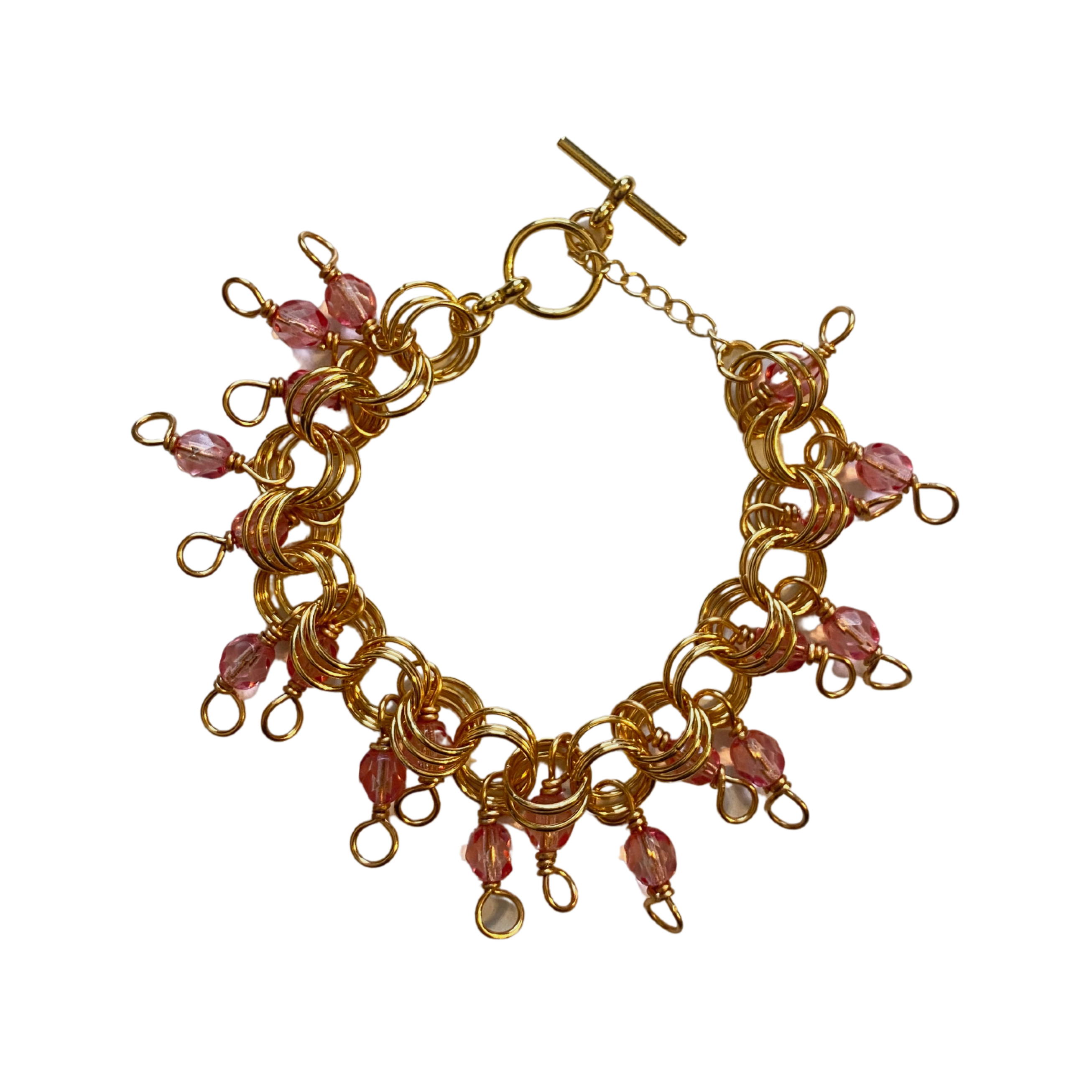 The Donna Bracelet in Crystal Rose featuring gold/silver-plated links and crystal rose Czech fire-polished glass beads with a toggle clasp.