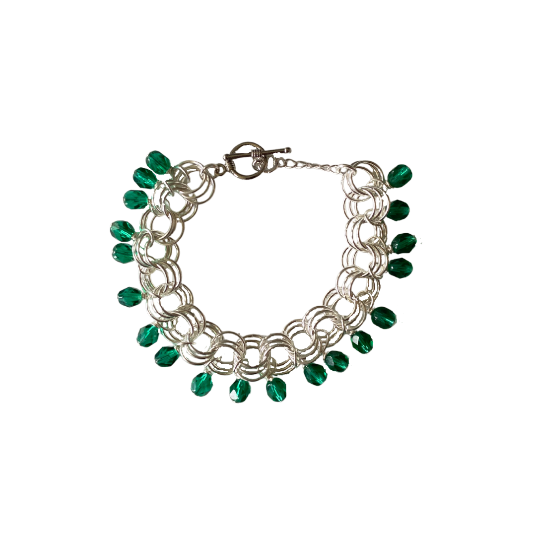 The Donna Bracelet in Teal featuring teal Czech glass beads and a toggle clasp, handcrafted by J. Kiere.