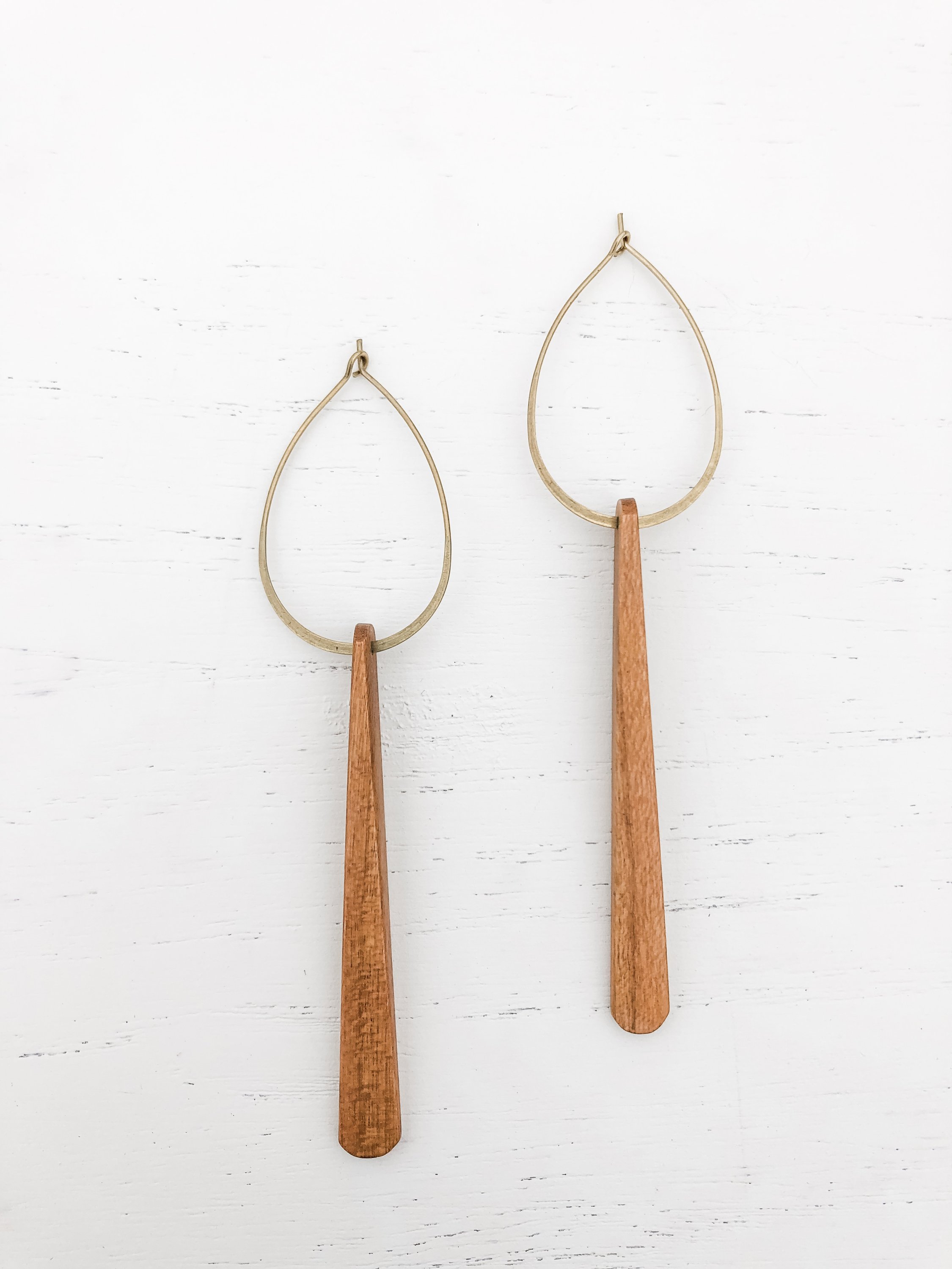 Elegant Midcentury Cherry Wood earrings featuring brass hoops and cherry wood accents, showcasing a modern design.