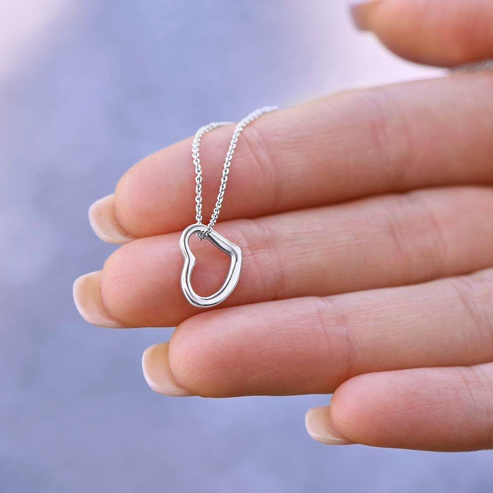 Delicate Heart Necklace in sterling silver with gold dip, elegantly displayed in a two-tone gift box.