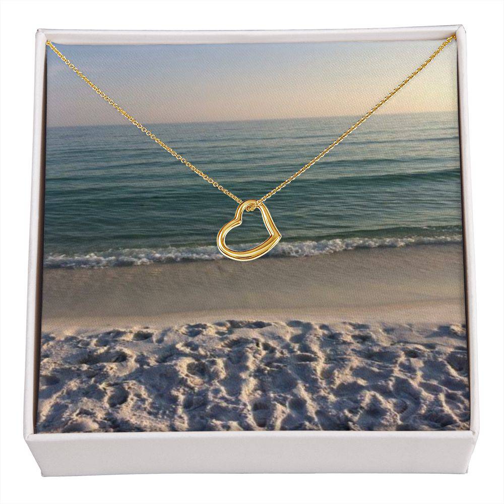 Delicate Heart Necklace in sterling silver with gold dip, elegantly displayed in a two-tone gift box.