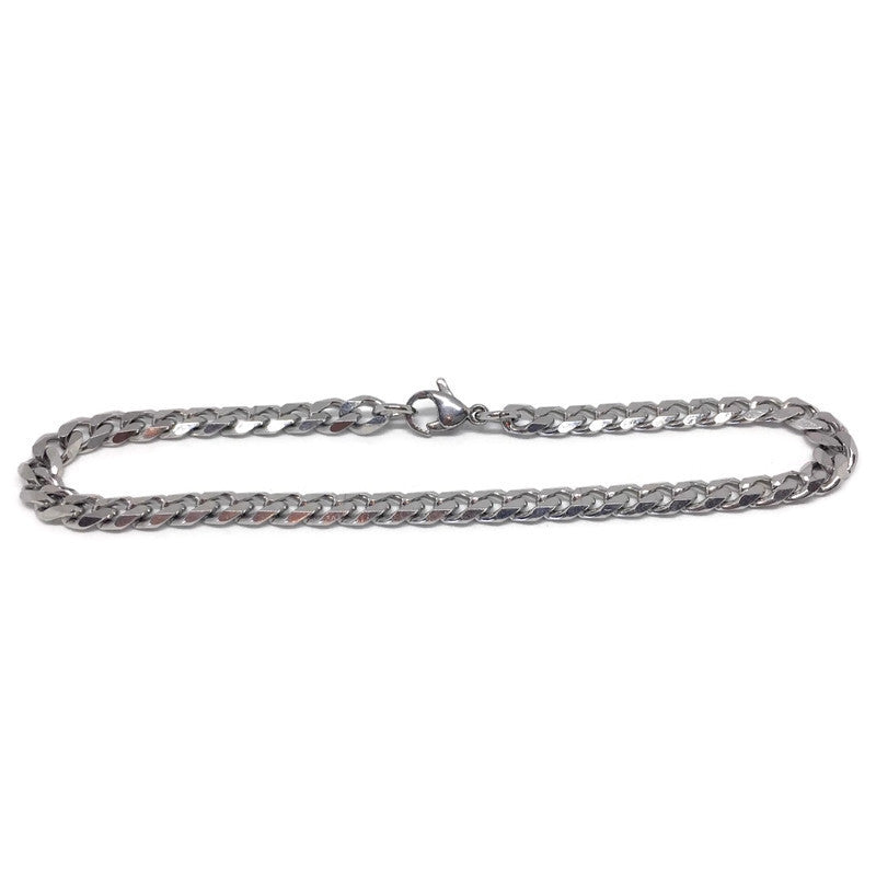 Thick Curb Chain Link Bracelet made of stainless steel, showcasing its shiny surface and sturdy links, available in various colors.