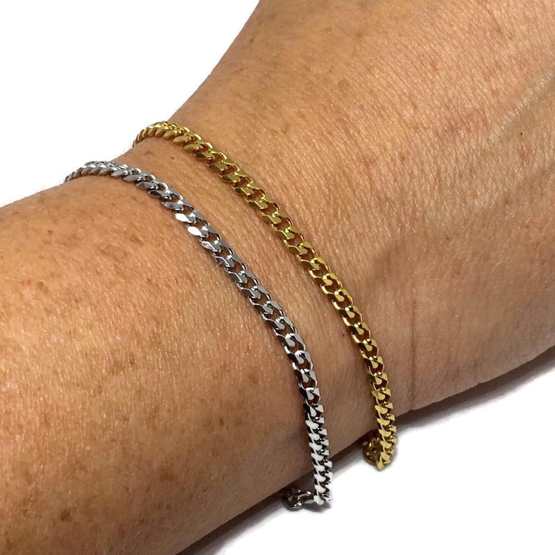 A stylish Thin Curb Chain Link Bracelet made of stainless steel, showcasing its sleek design and shiny finish.