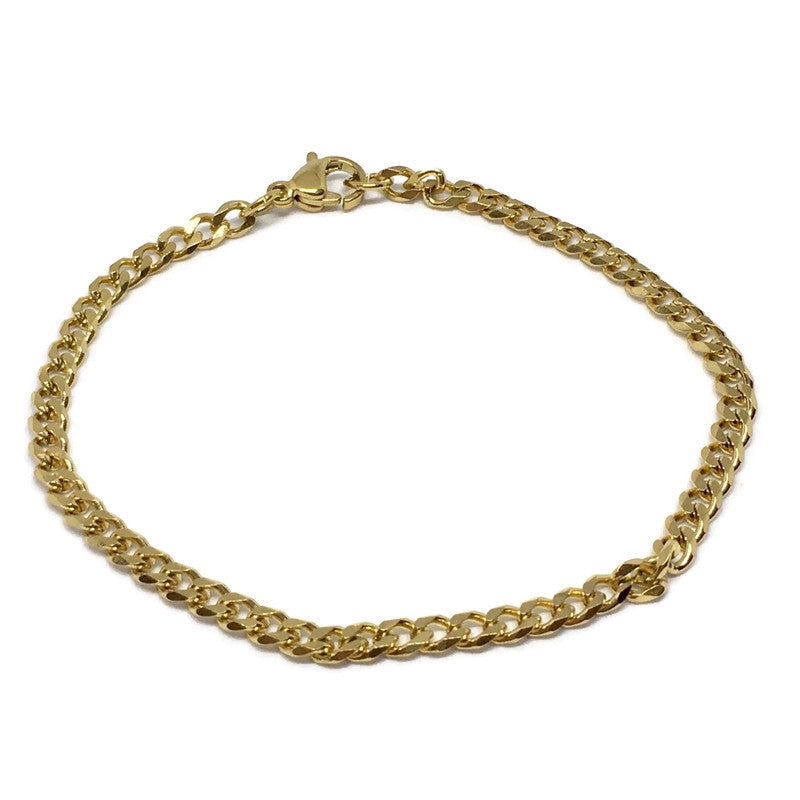 A stylish Thin Curb Chain Link Bracelet made of stainless steel, showcasing its sleek design and shiny finish.