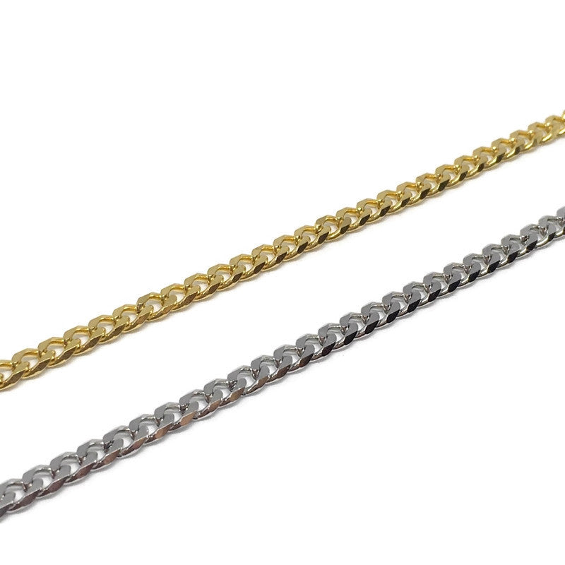 A stylish Thin Curb Chain Link Bracelet made of stainless steel, showcasing its sleek design and shiny finish.