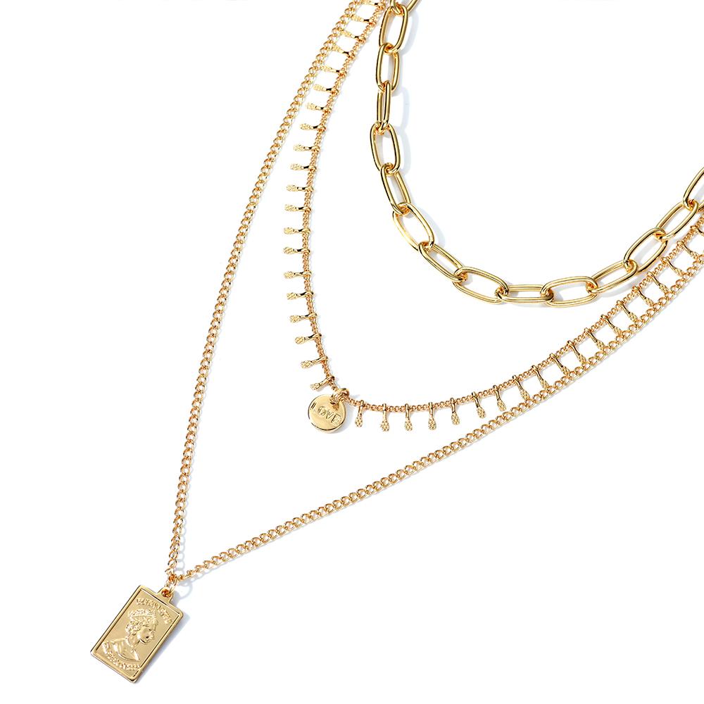 Three layer necklace featuring a rectangle pendant, elegantly designed with a 14k gold plated finish.