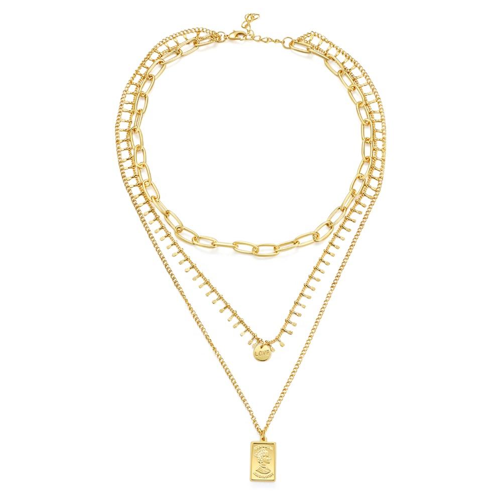 Three layer necklace featuring a rectangle pendant, elegantly designed with a 14k gold plated finish.