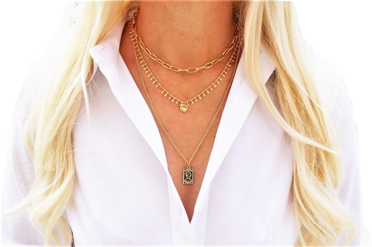 Three layer necklace featuring a rectangle pendant, elegantly designed with a 14k gold plated finish.