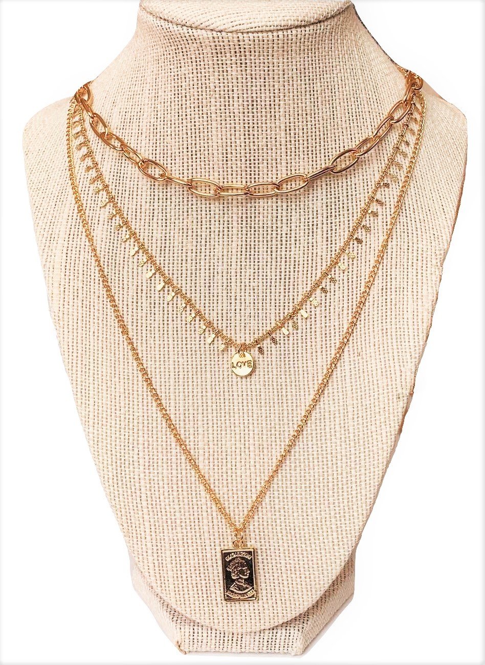 Three layer necklace featuring a rectangle pendant, elegantly designed with a 14k gold plated finish.