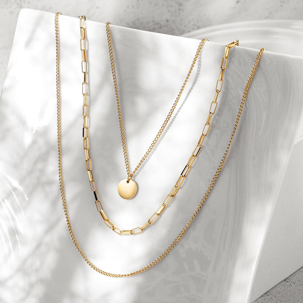 Three Layered Chain made of 316L surgical stainless steel with 14K gold PVD plating, showcasing its elegant design and durability.