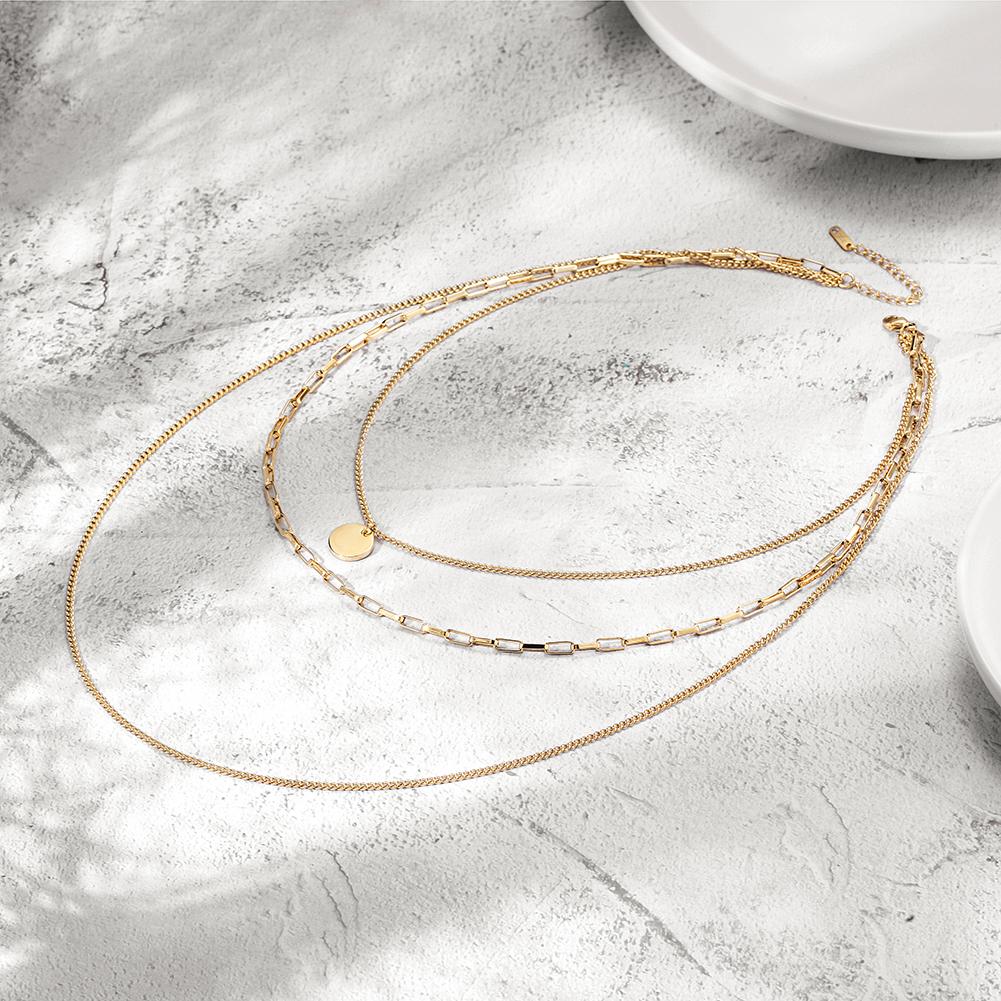 Three Layered Chain made of 316L surgical stainless steel with 14K gold PVD plating, showcasing its elegant design and durability.