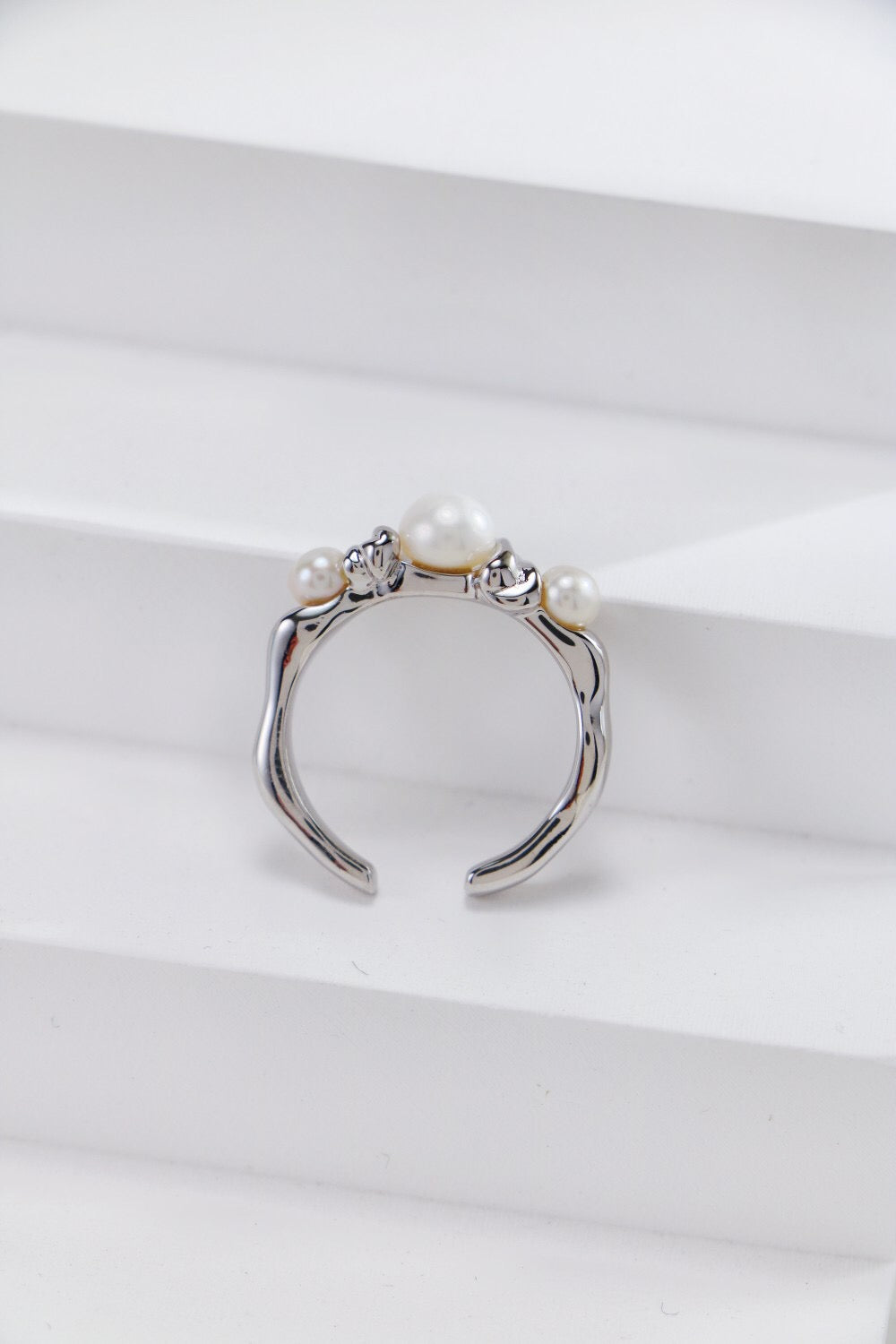 Three Pearls Open Ring featuring three genuine freshwater pearls on a sterling silver or gold vermeil band, elegantly designed and adjustable.