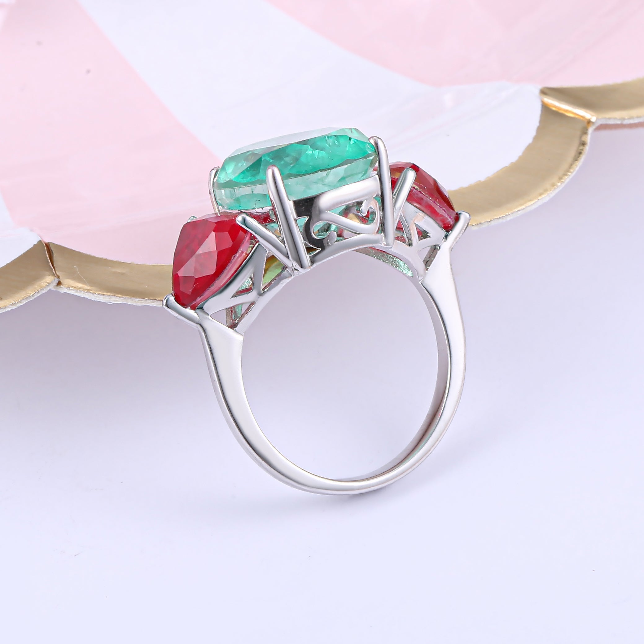 Three Stones Classic Eternity Ring in 925 sterling silver with paraiba ruby stones, showcasing a luxurious design.