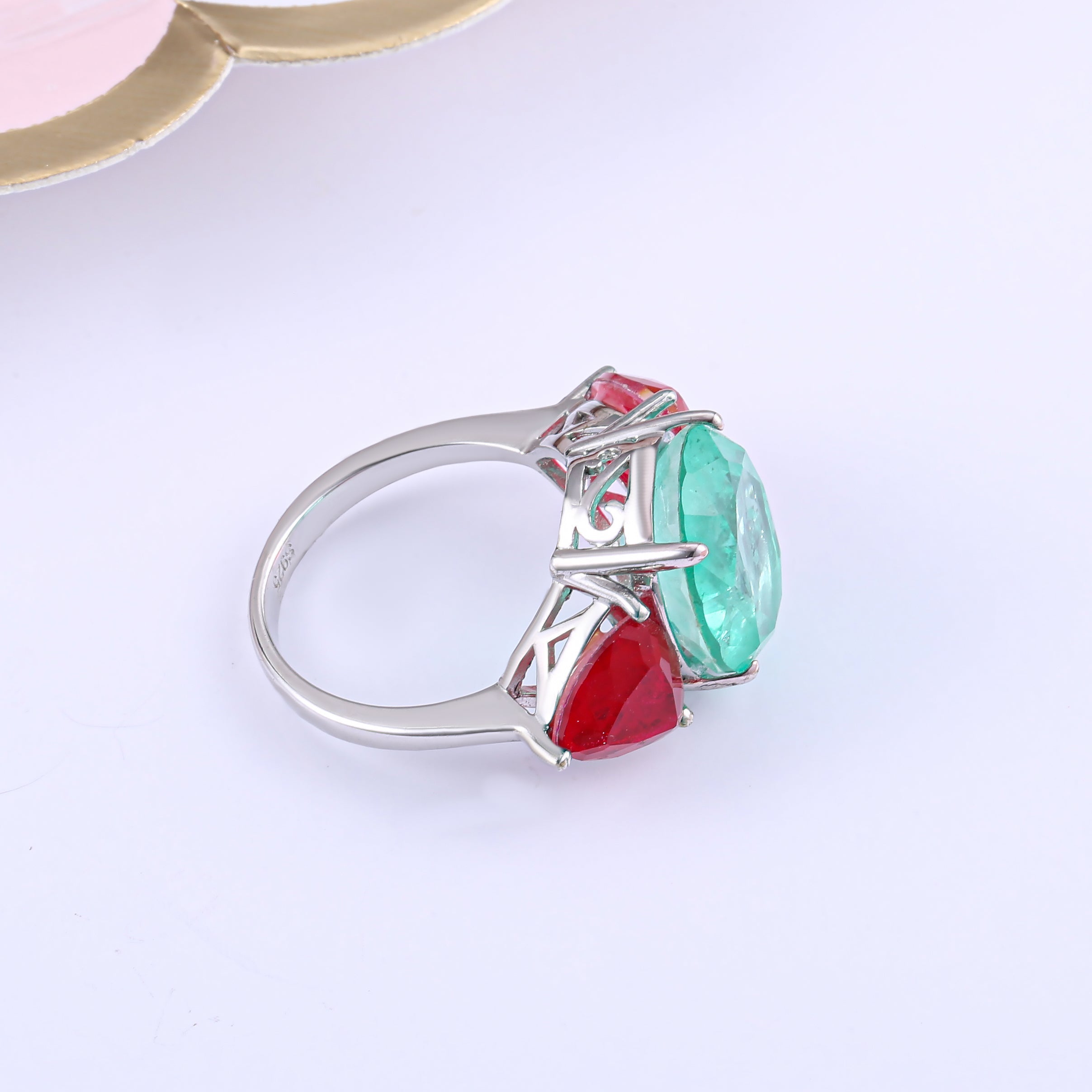 Three Stones Classic Eternity Ring in 925 sterling silver with paraiba ruby stones, showcasing a luxurious design.