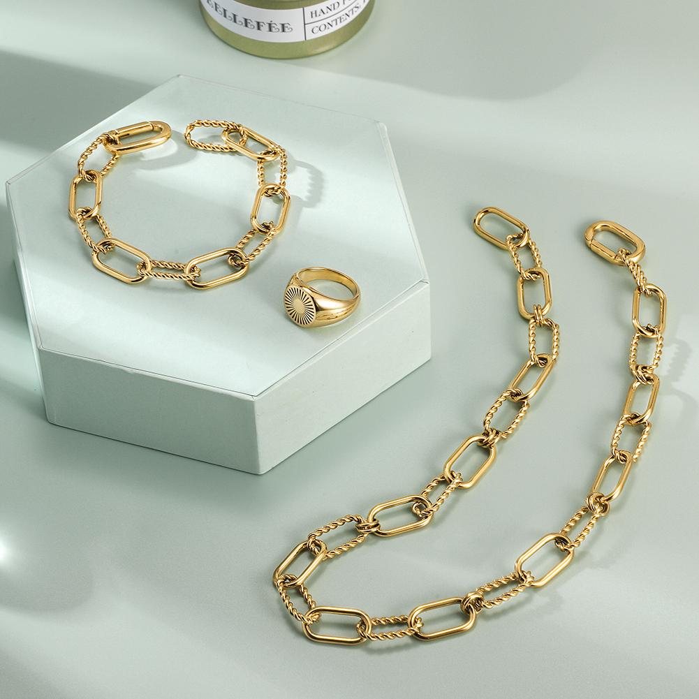 THREADER INTERLOCKING LINK SET featuring a geometric necklace, bracelet, and ring in a delicate gift box.