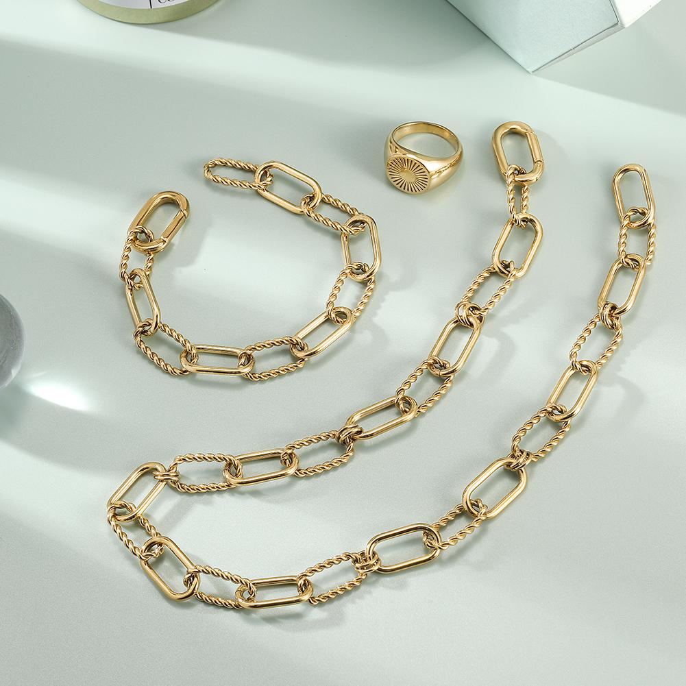 THREADER INTERLOCKING LINK SET featuring a geometric necklace, bracelet, and ring in a delicate gift box.