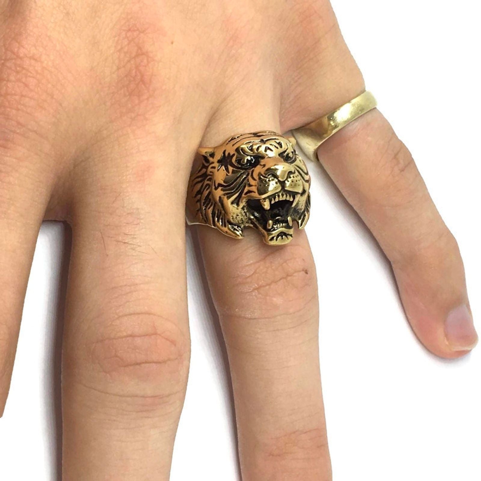 A stunning Tibetan Tiger Statement Ring made from 18ct gold and sterling silver plated steel alloy, featuring a bold tiger design.