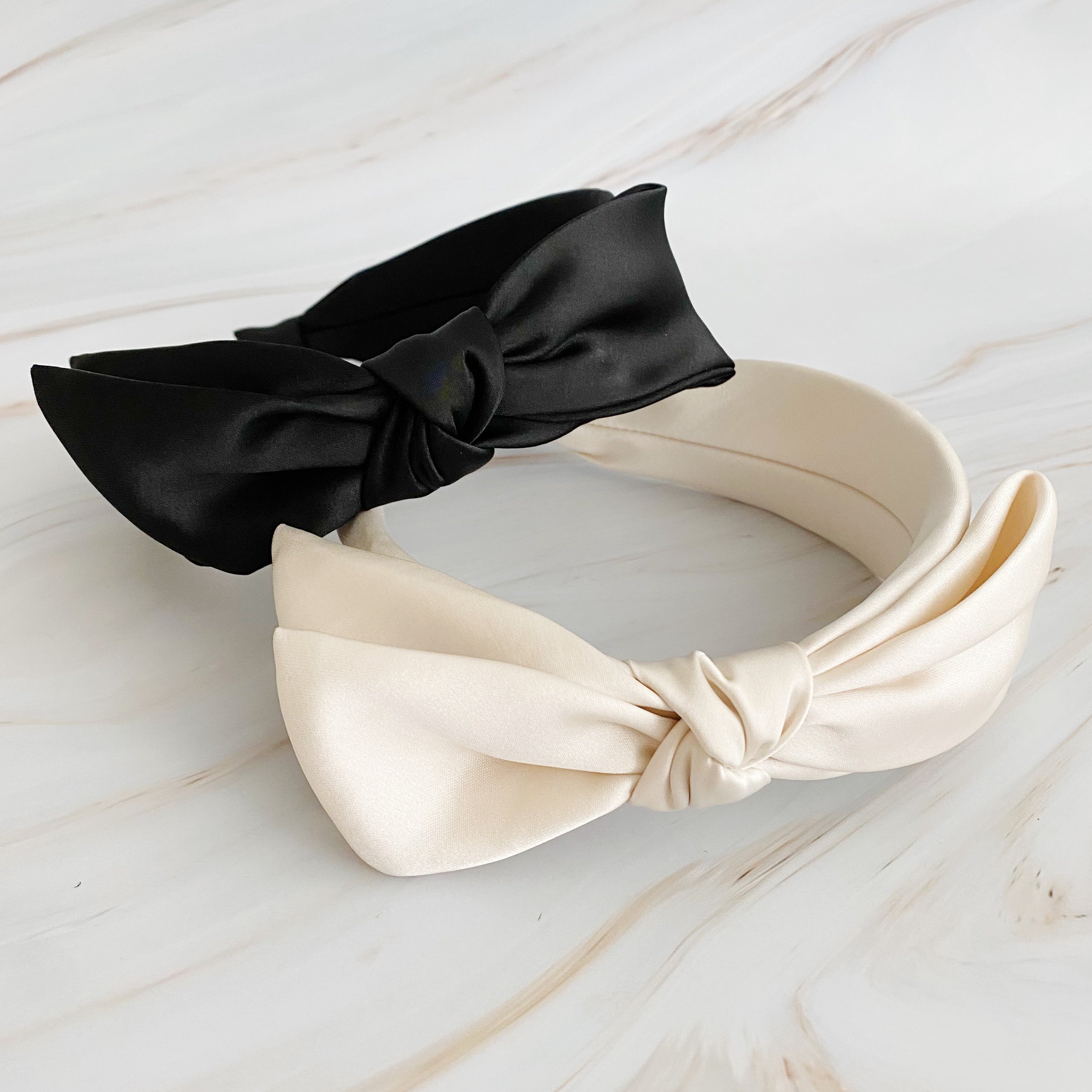 Elegant Tied Satin Side Bow Headband in luxurious satin fabric with a chic side bow design.