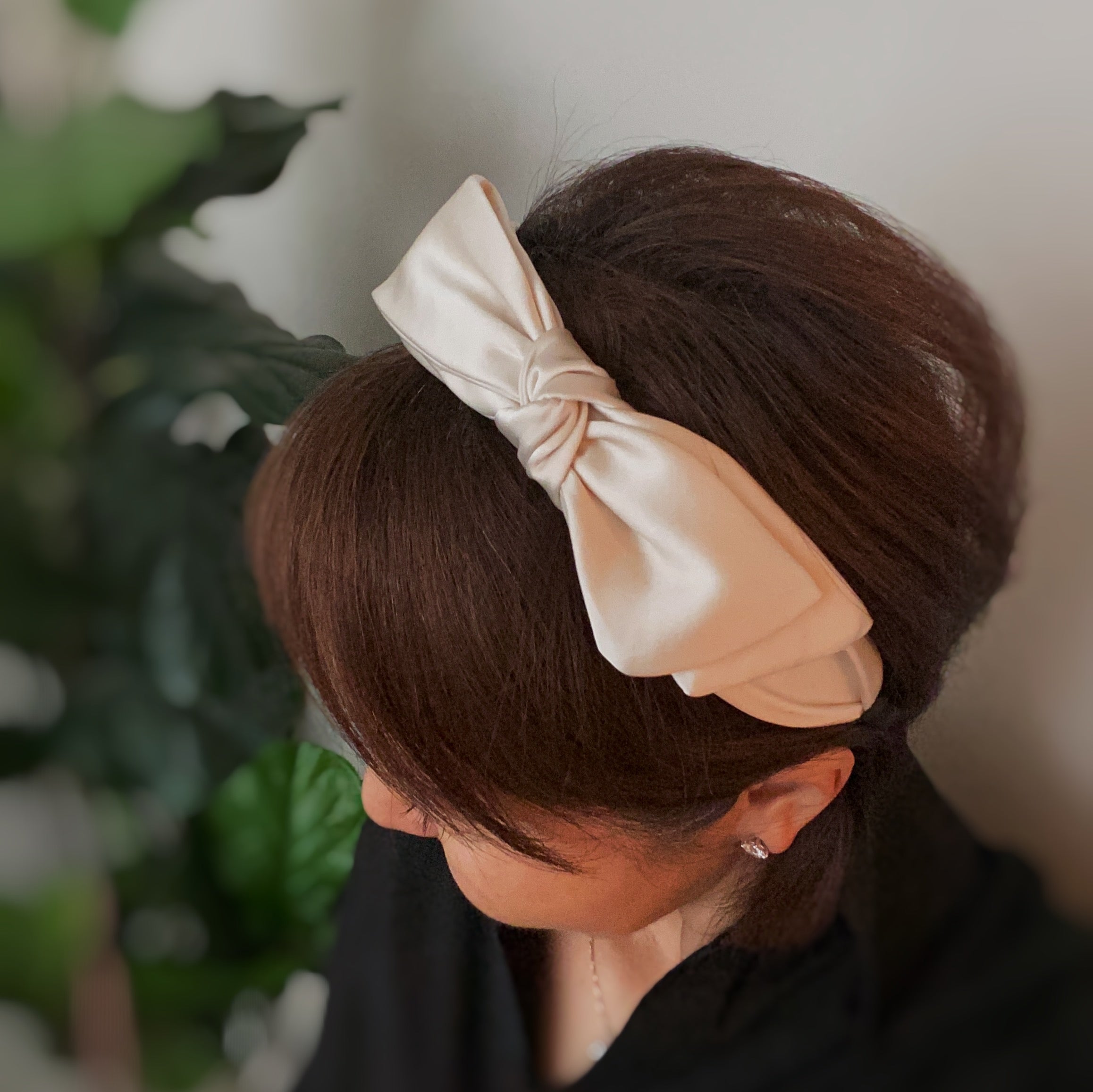 Elegant Tied Satin Side Bow Headband in luxurious satin fabric with a chic side bow design.