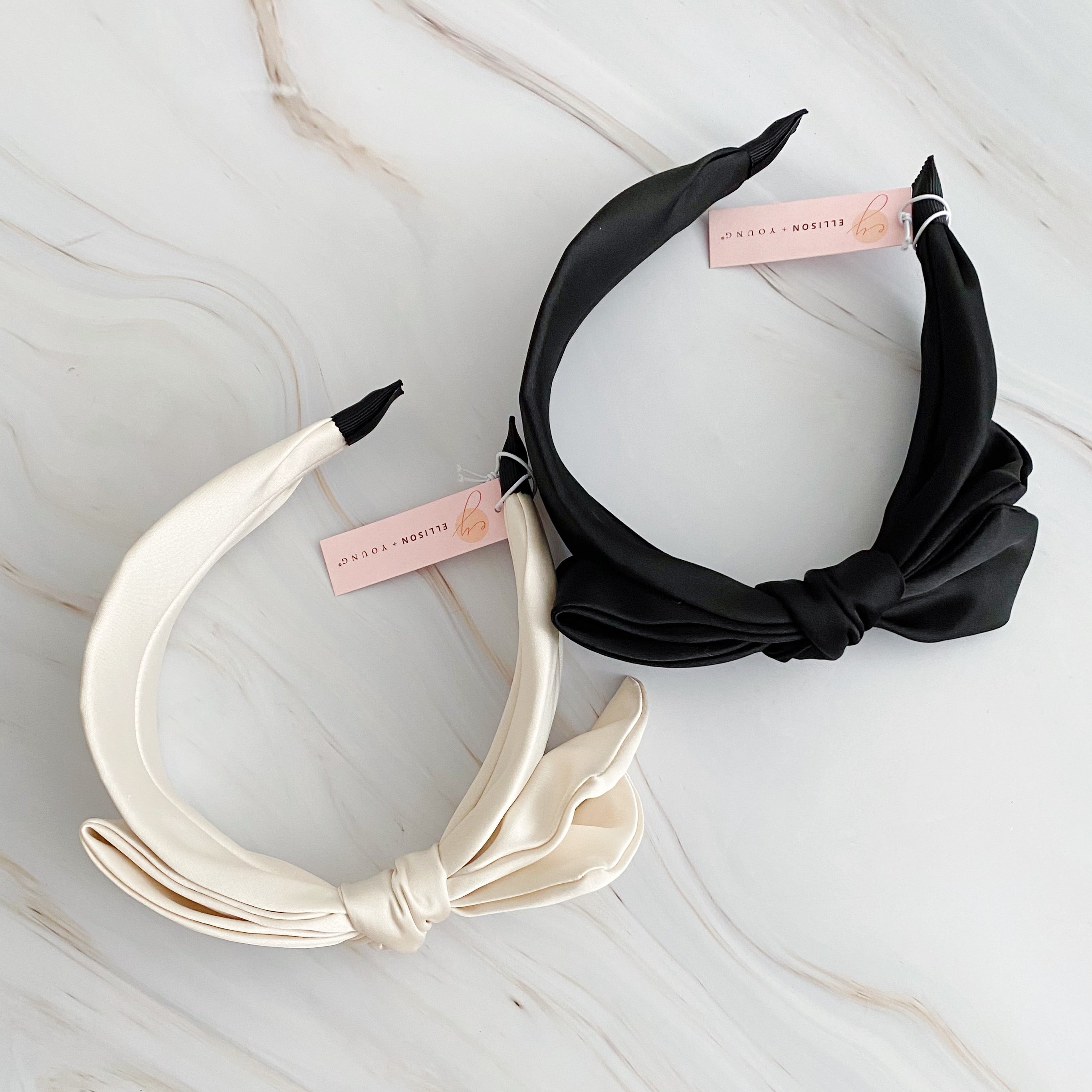 Elegant Tied Satin Side Bow Headband in luxurious satin fabric with a chic side bow design.