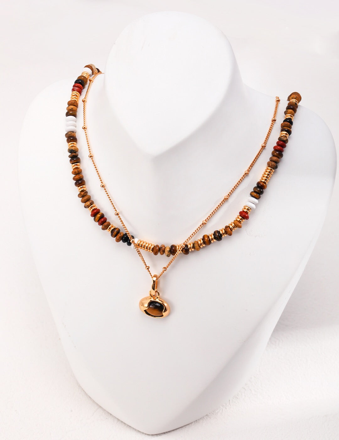 A beautiful handmade Tiger Eye Gemstone Beads Necklace featuring various gemstones and 18ct gold vermeil accents, elegantly displayed.