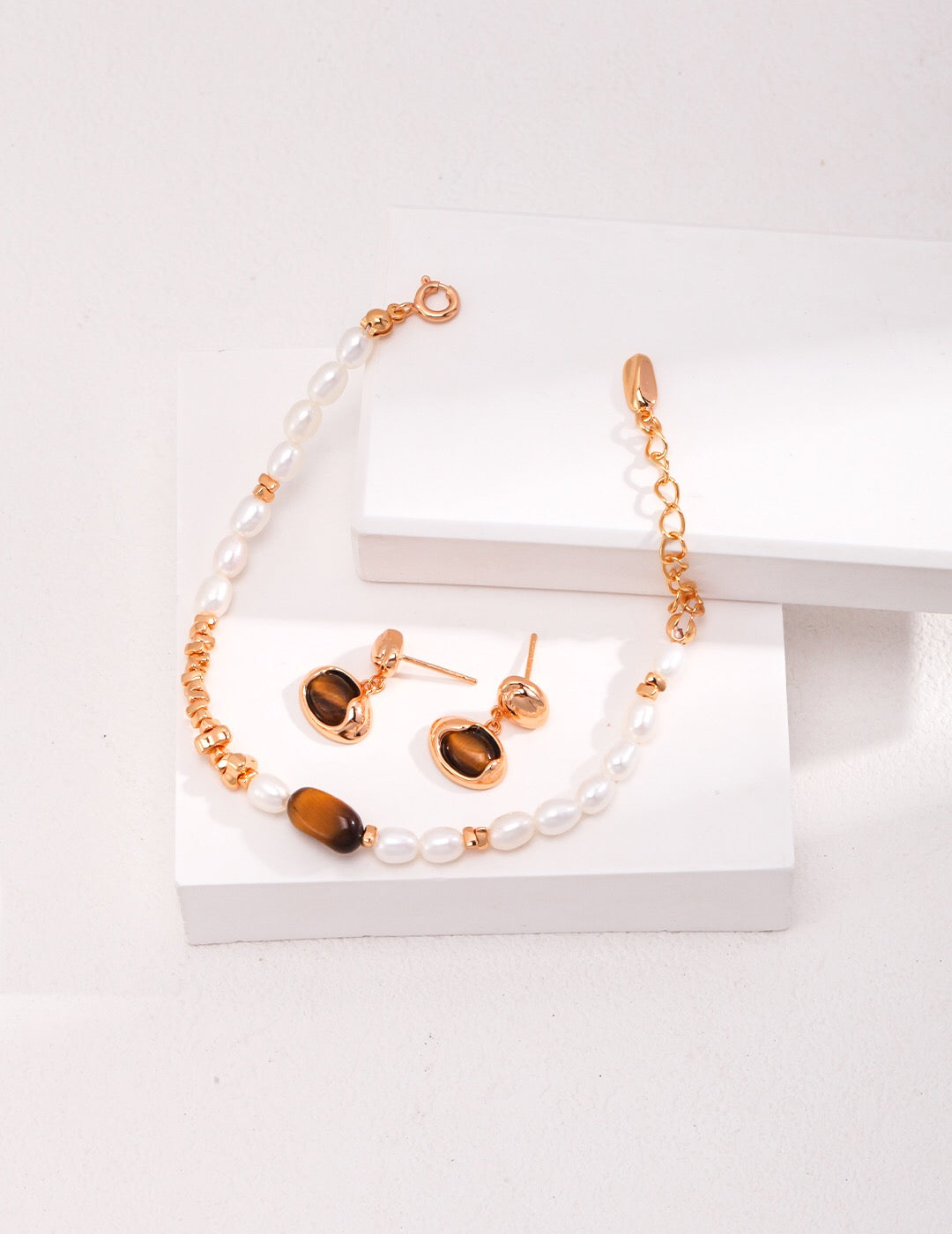 Handmade Tiger Eye Stone Pearl Bracelet featuring sterling silver and gold vermeil, adjustable length with elegant design.