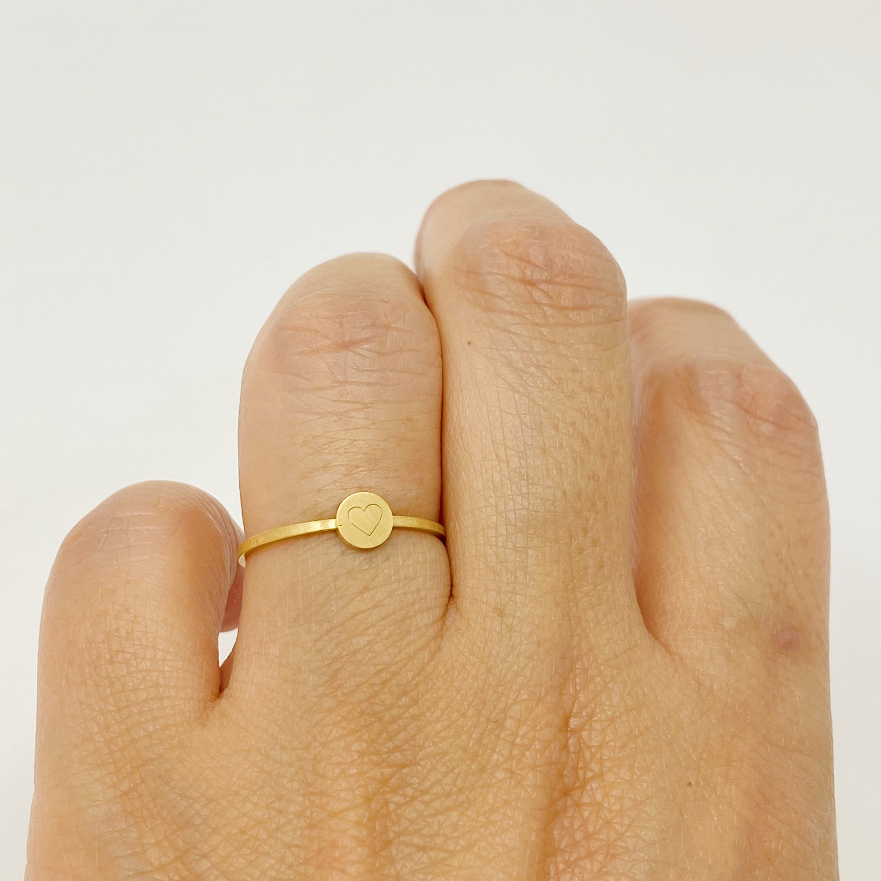 Tiny Disc Stackable Ring featuring monogrammed symbols, 18K gold plated stainless steel, size 7.