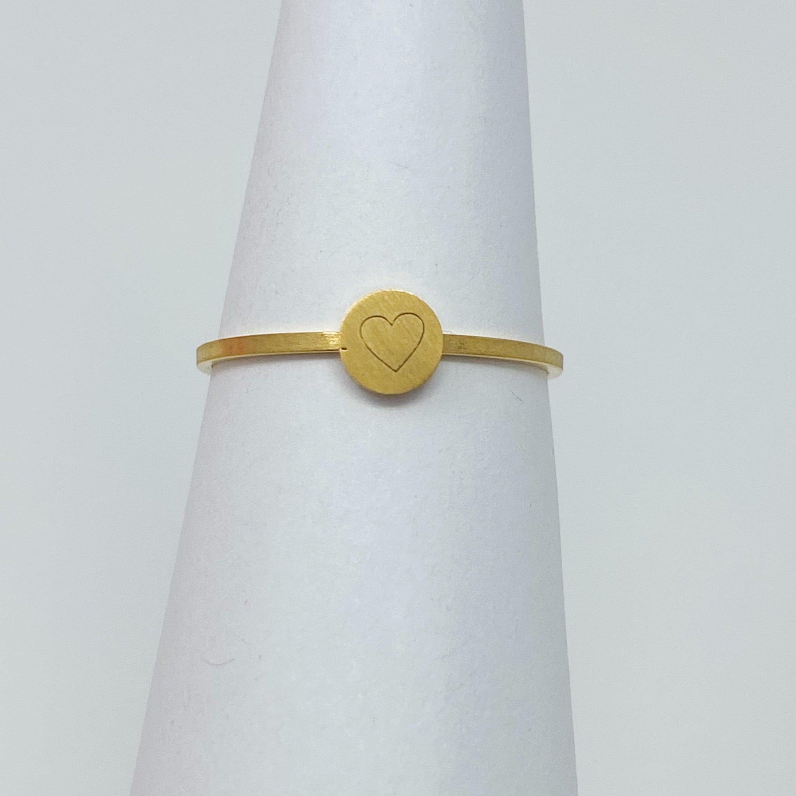 Tiny Disc Stackable Ring featuring monogrammed symbols, 18K gold plated stainless steel, size 7.