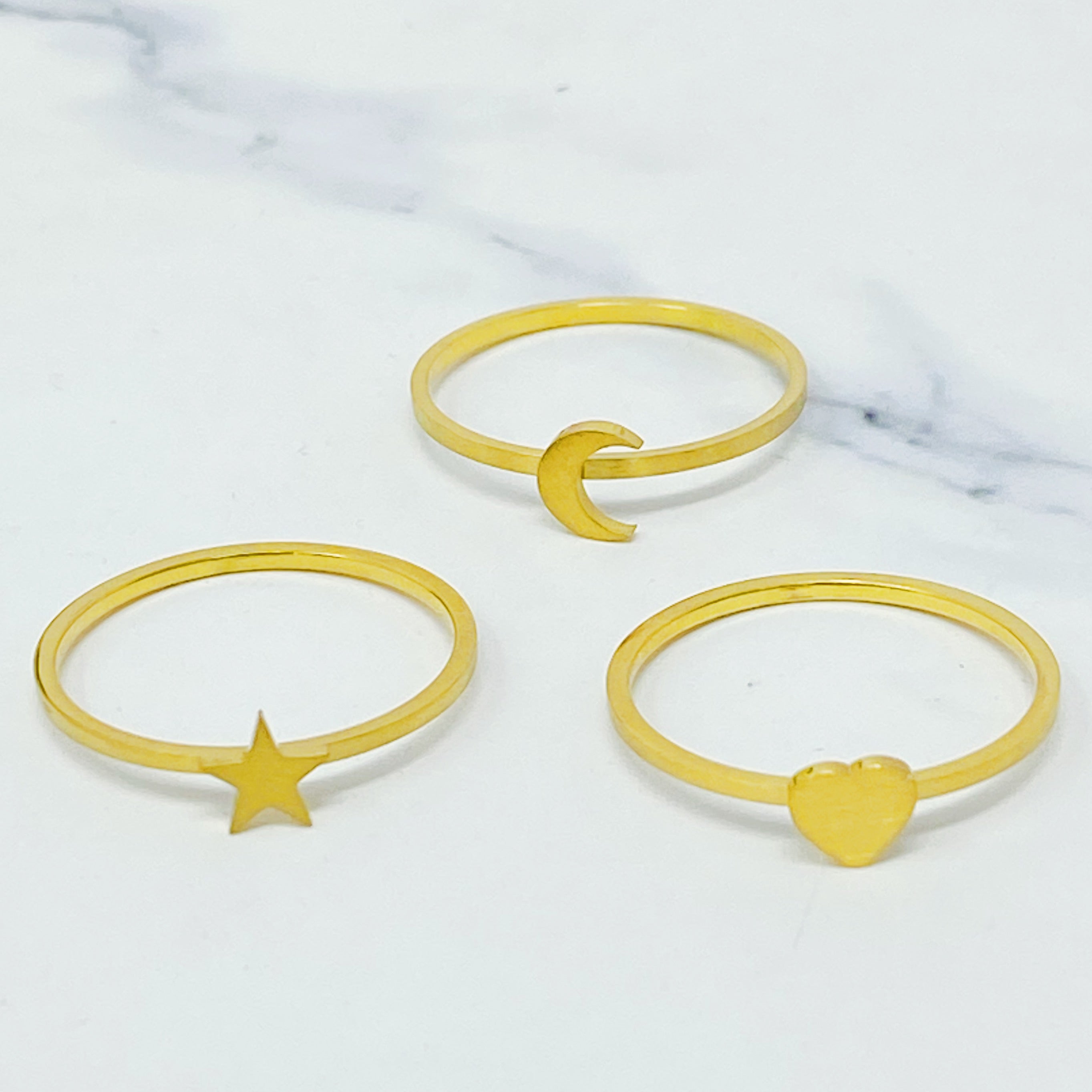 Tiny Figure Stackable Ring featuring various shapes, 18K gold plated stainless steel, size 7, perfect for stacking.