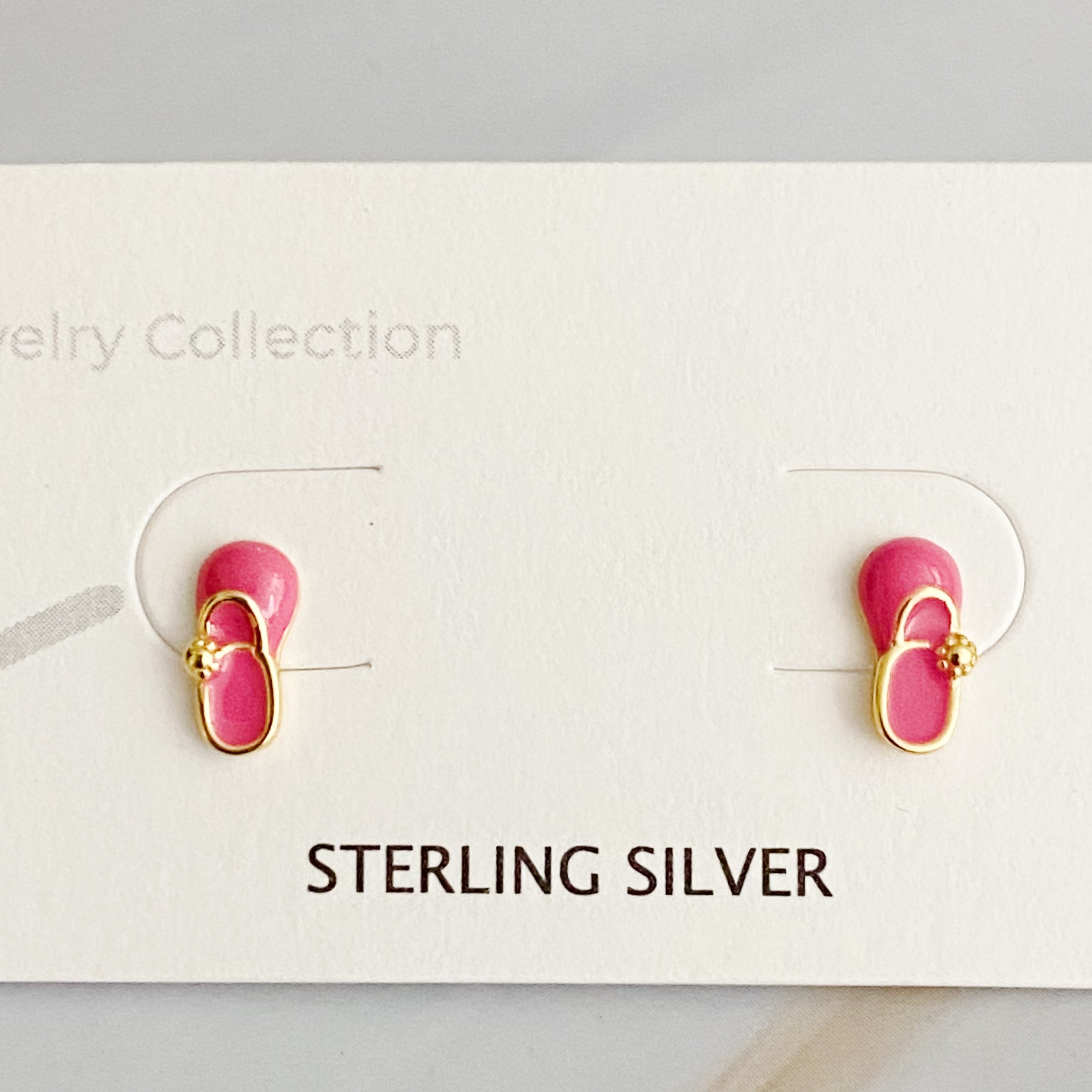 Tiny Shape Tiny Stud Sterling Silver Earrings featuring heart and flip flop designs, elegantly displayed on a logo card.