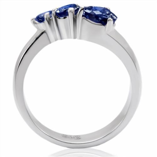 High polished stainless steel ring featuring a synthetic glass center stone in Montana color, showcasing a sleek and modern design.