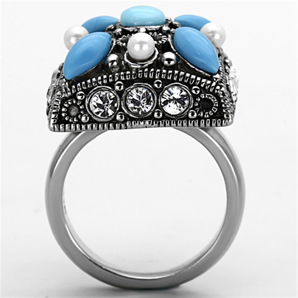 TK1309 High Polished Stainless Steel Ring featuring a vibrant synthetic turquoise stone in a sleek design.