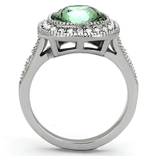 High polished stainless steel ring featuring an emerald crystal centerpiece, showcasing a sleek and modern design.