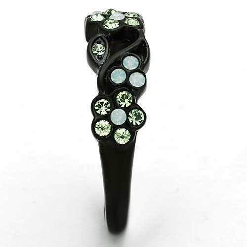 Black ring with green gemstones.