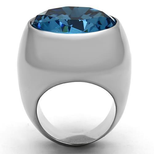 High polished stainless steel ring featuring a sea blue synthetic glass stone, showcasing a sleek and elegant design.