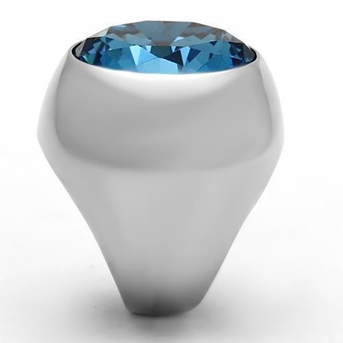 High polished stainless steel ring featuring a sea blue synthetic glass stone, showcasing a sleek and elegant design.