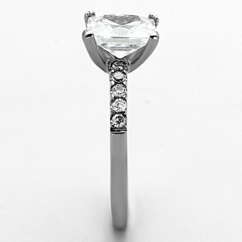 High polished stainless steel ring featuring a clear AAA grade cubic zirconia center stone, showcasing a sleek and elegant design.