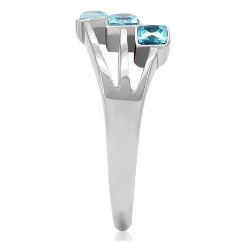 TK180 High Polished Stainless Steel Ring featuring a synthetic sea blue glass center stone, showcasing its elegant design and polished finish.